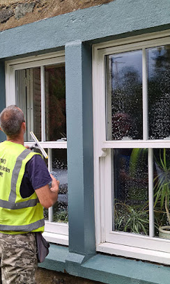 Window cleaner working on a property in Strathearn